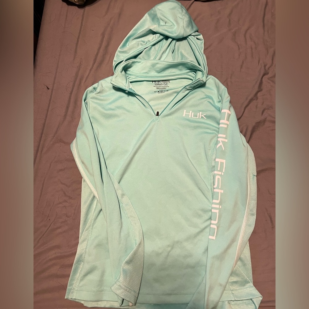 Women’s Huk Preformance Fishing long-sleeve shirt.